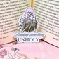 Reading Something Unholy Sticker